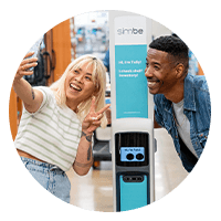 Woman and man taking selfie with Tally the Robot